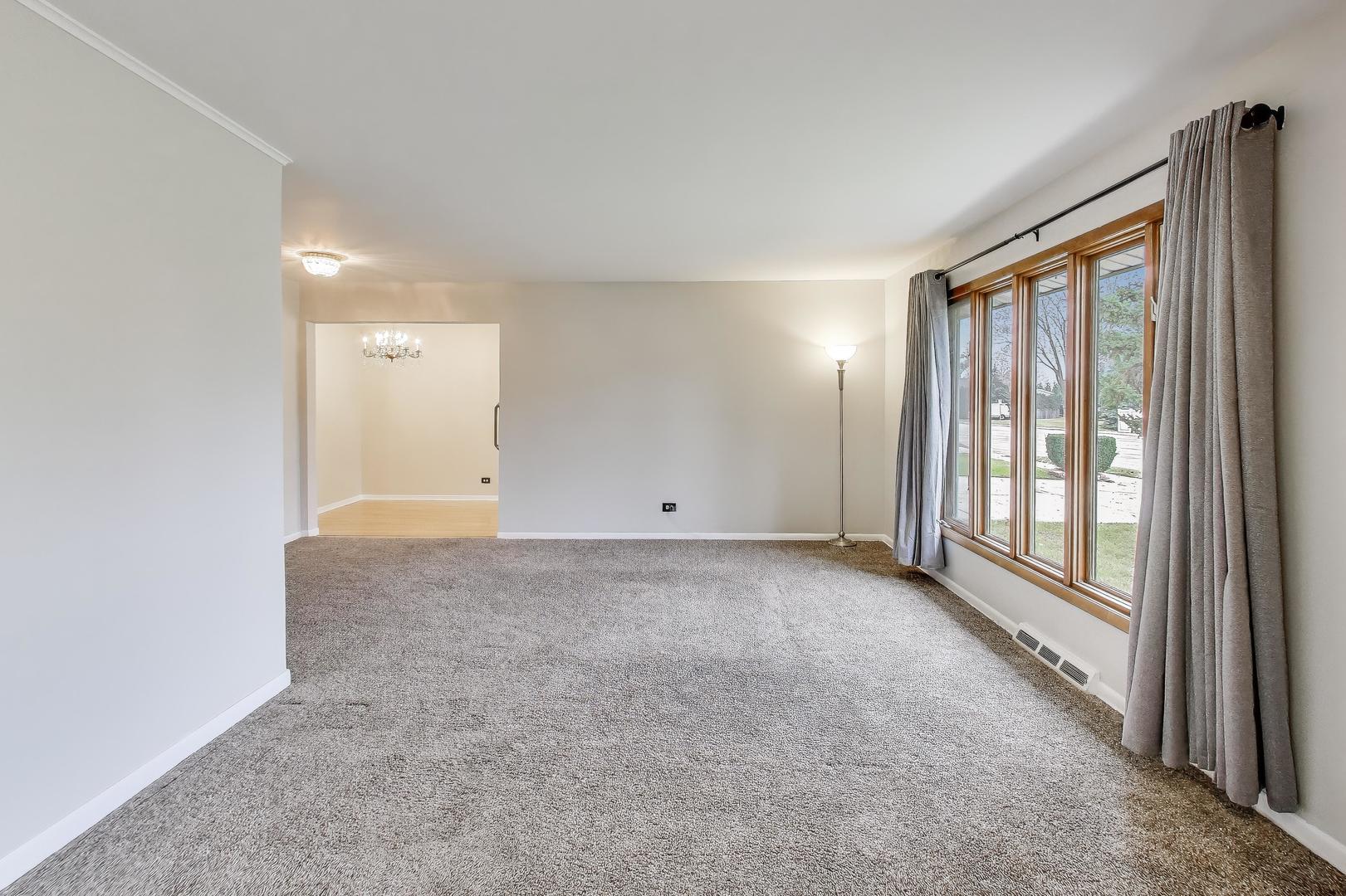 400 Landmeier Road Elk Grove Village, IL 60007 - Photo 7 of 33 a view of an empty room and a window