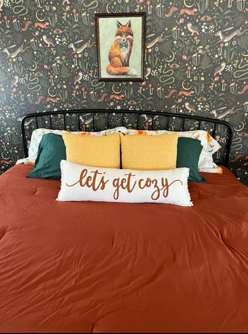 a view of a street with benches in the back