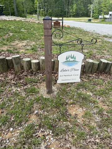 a view of a water fountain with a big yard