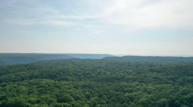 a view of a lake from a balcony