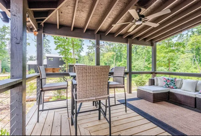 a patio with patio lots of furniture and garden view