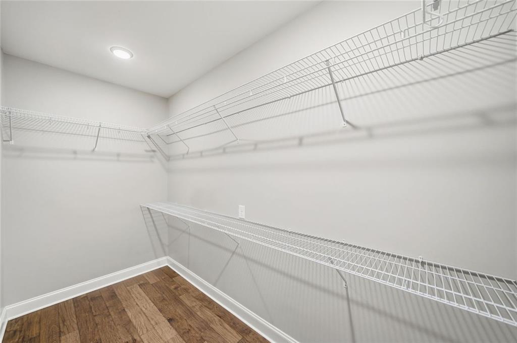 1006 Owens Store Road Canton, GA 30115 - Photo 28 of 48 a view of a room with racks on the wall
