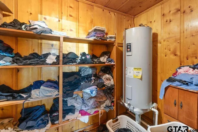 a room with lots of different colored cloths