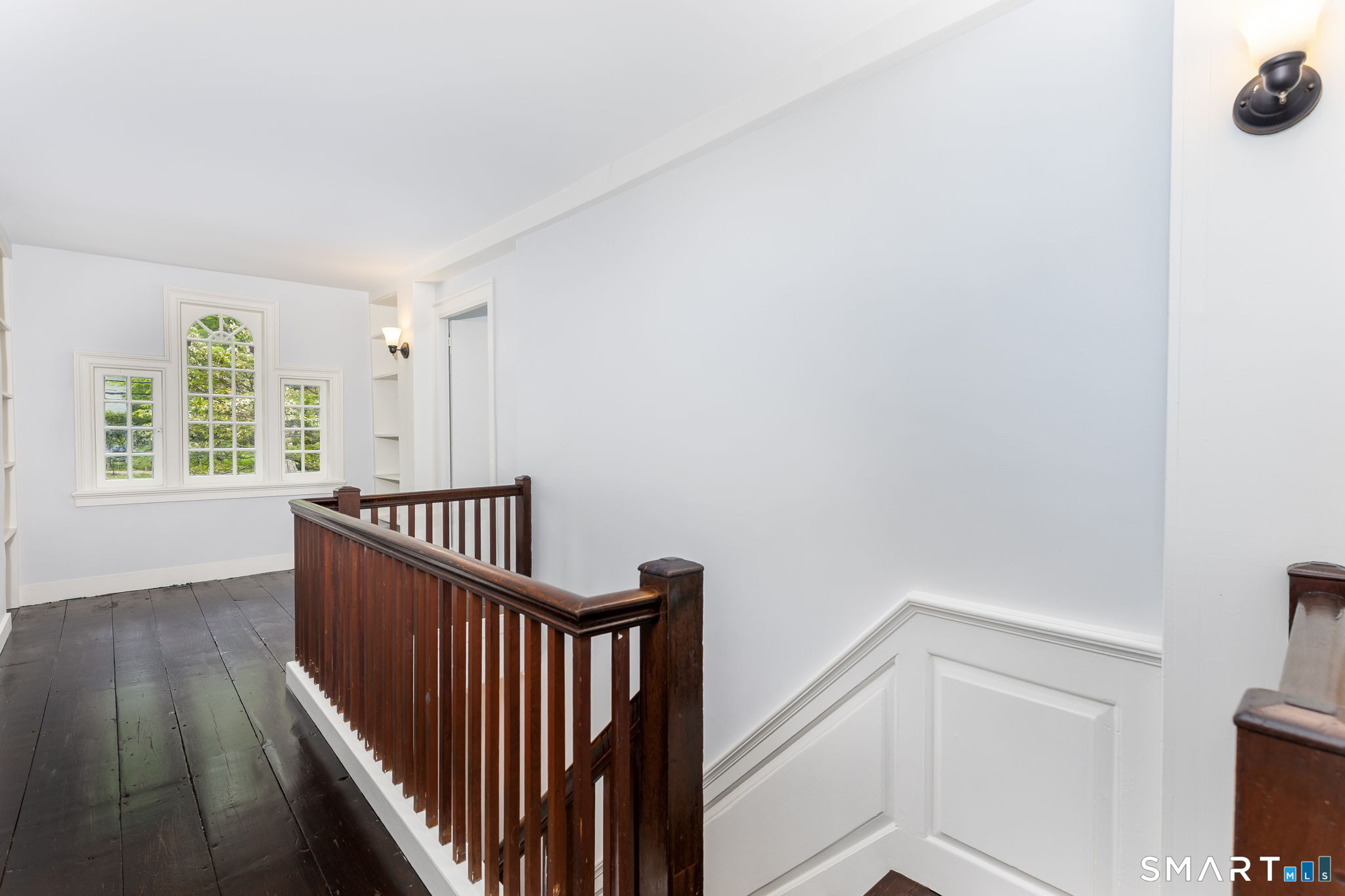 79 Deforest Street Watertown, CT 06795 - Photo 18 of 28 a view of entryway with wooden floor and windows