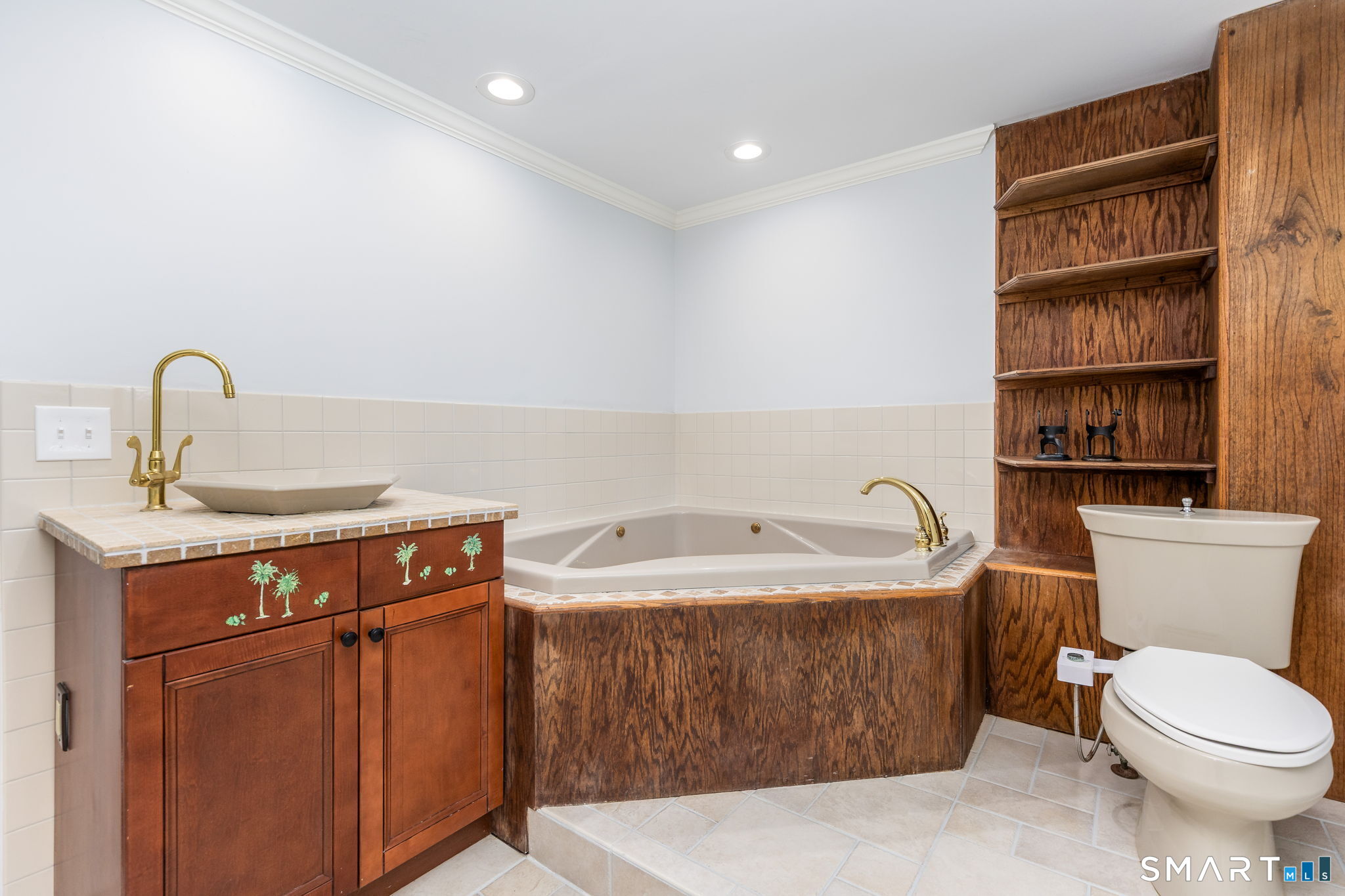 79 Deforest Street Watertown, CT 06795 - Photo 27 of 28 a bathroom with a sink a toilet and a mirror