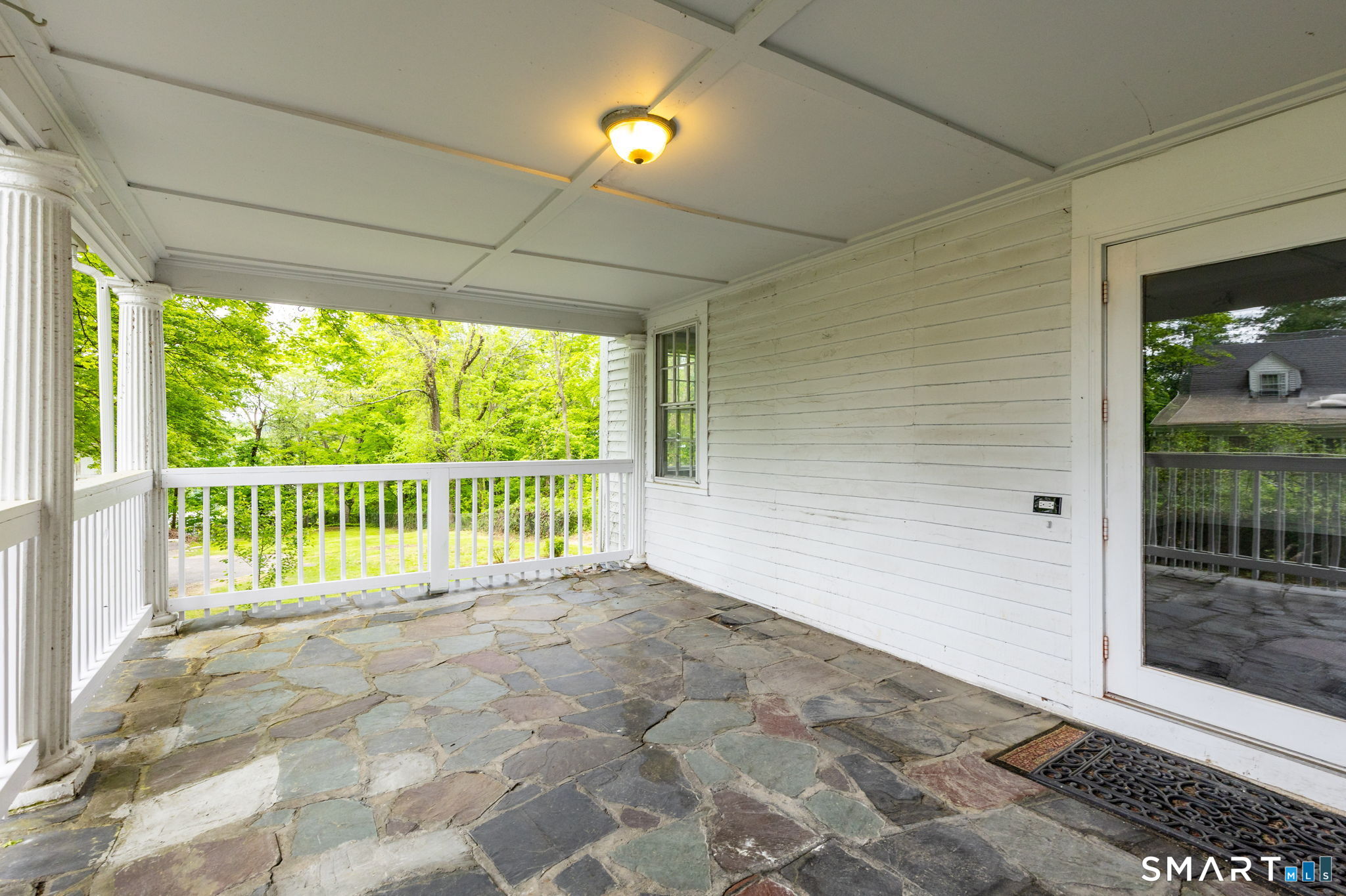 79 Deforest Street Watertown, CT 06795 - Photo 6 of 28 a view of a room with a large window