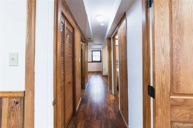 a view of gallery with wooden floor