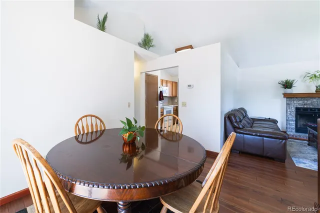 a view of livingroom and dining room with furniture