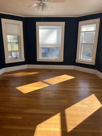 a view of outdoor space window and wooden floor