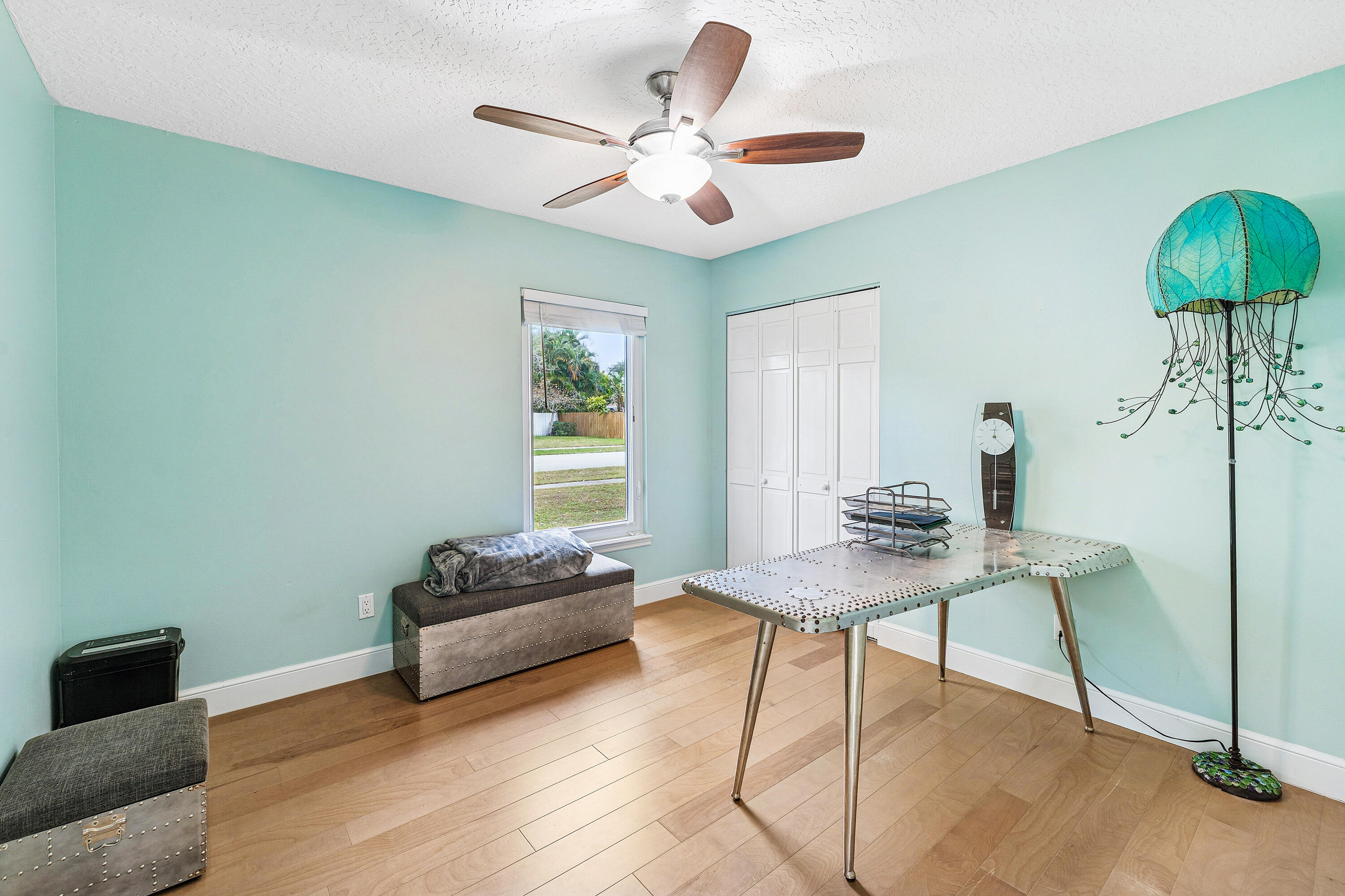 709 Warren Drive Jupiter, FL 33458 - Photo 18 of 56 a living room with furniture and a window