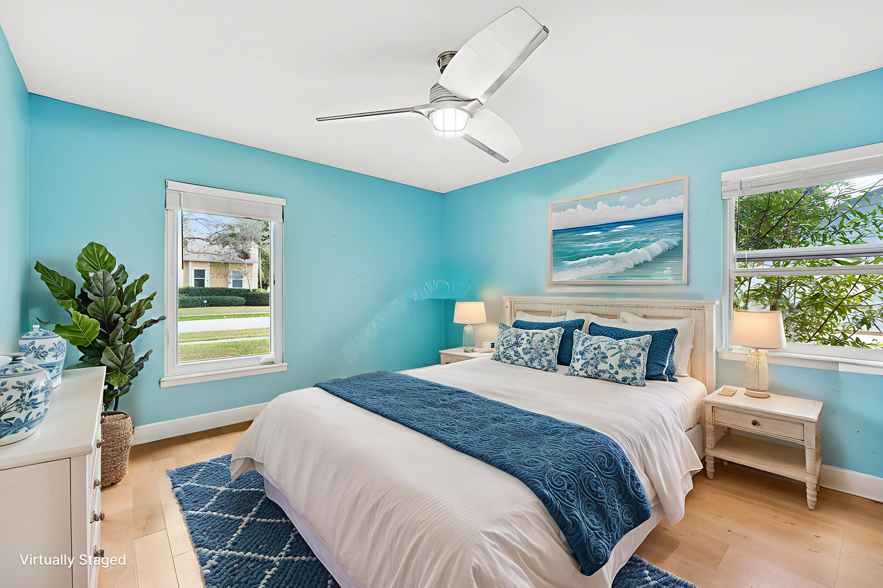 709 Warren Drive Jupiter, FL 33458 - Photo 21 of 56 a bedroom with a large bed and a window