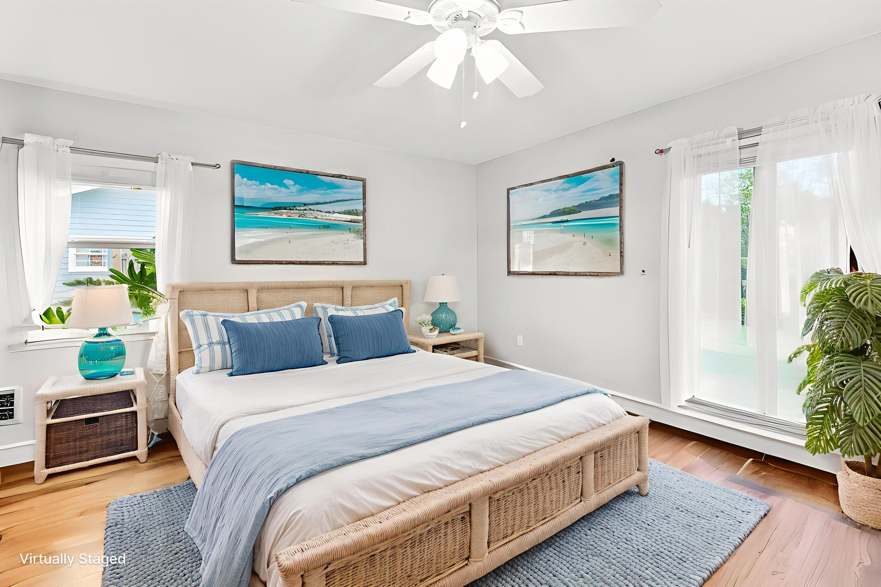 709 Warren Drive Jupiter, FL 33458 - Photo 24 of 56 a bedroom with a bed and a painting on the wall