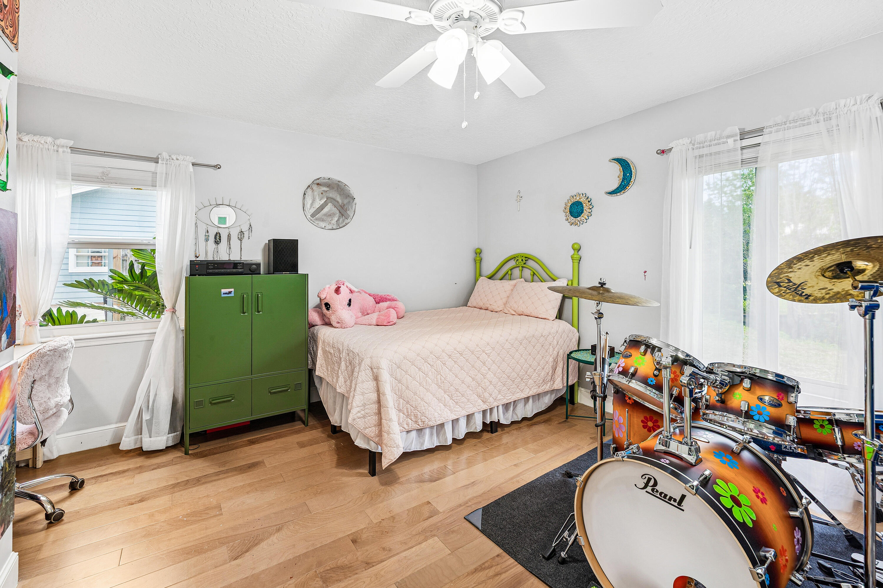 709 Warren Drive Jupiter, FL 33458 - Photo 25 of 56 a bedroom with bed and a mirror