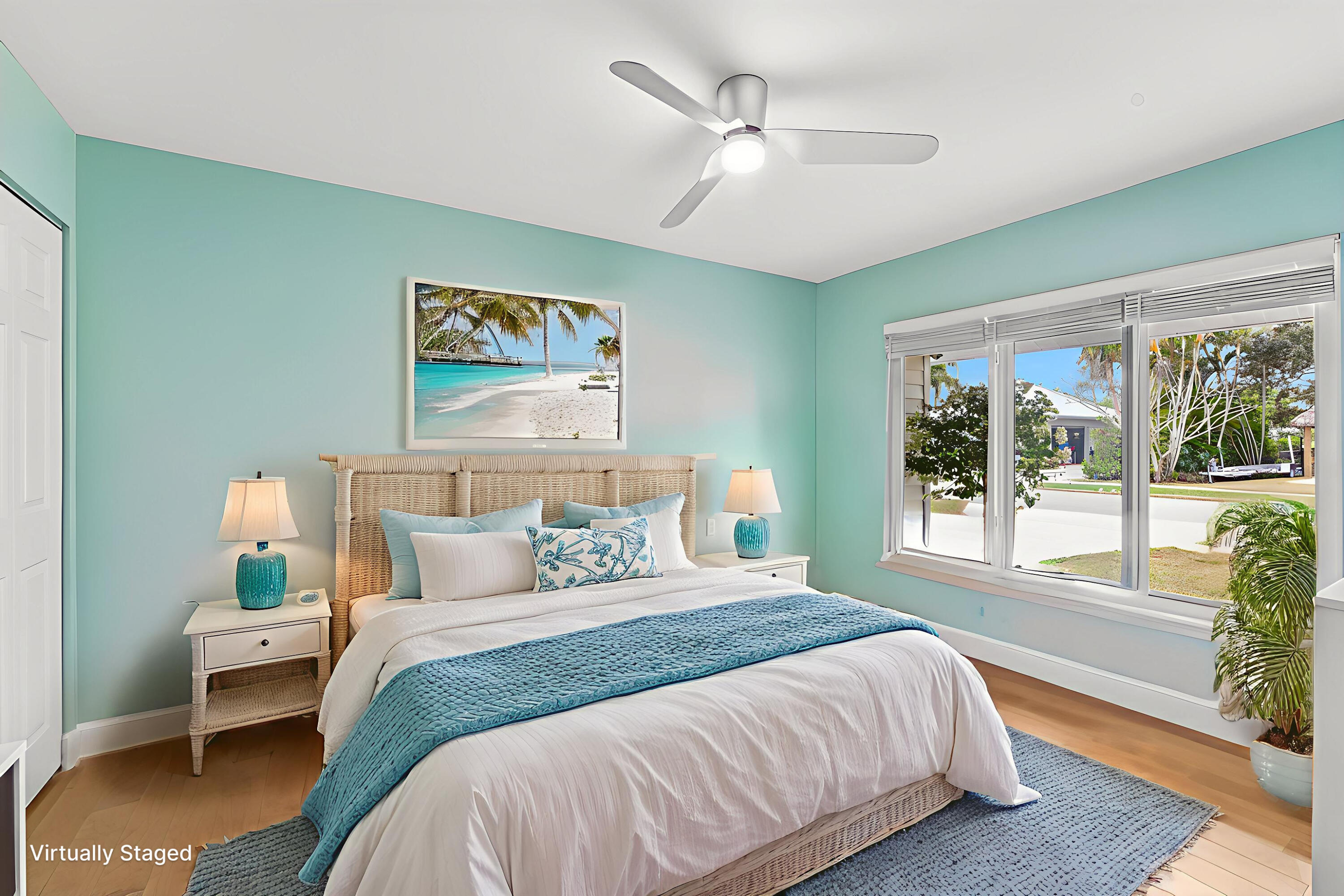 709 Warren Drive Jupiter, FL 33458 - Photo 29 of 56 a bedroom with a bed and a large window