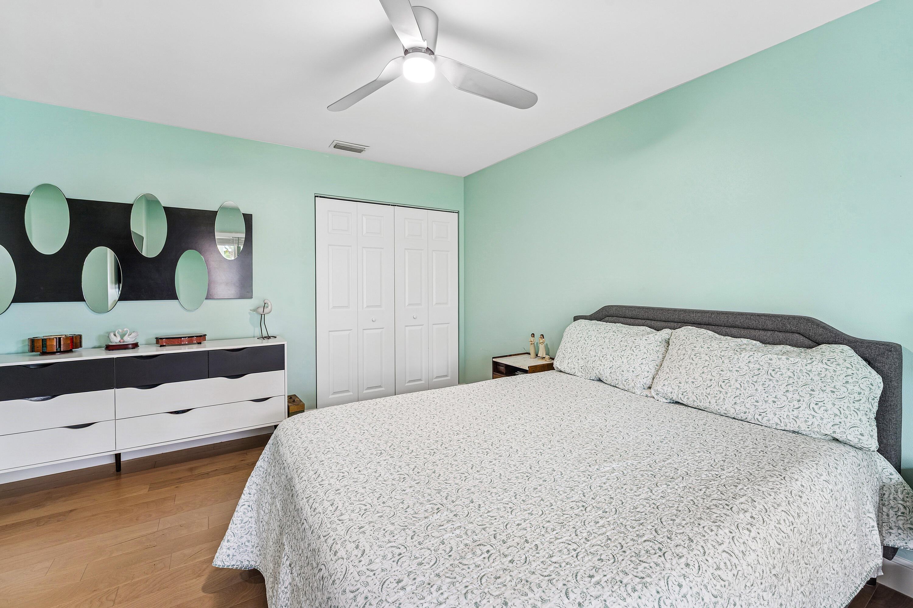 709 Warren Drive Jupiter, FL 33458 - Photo 32 of 56 a bedroom with a bed and window