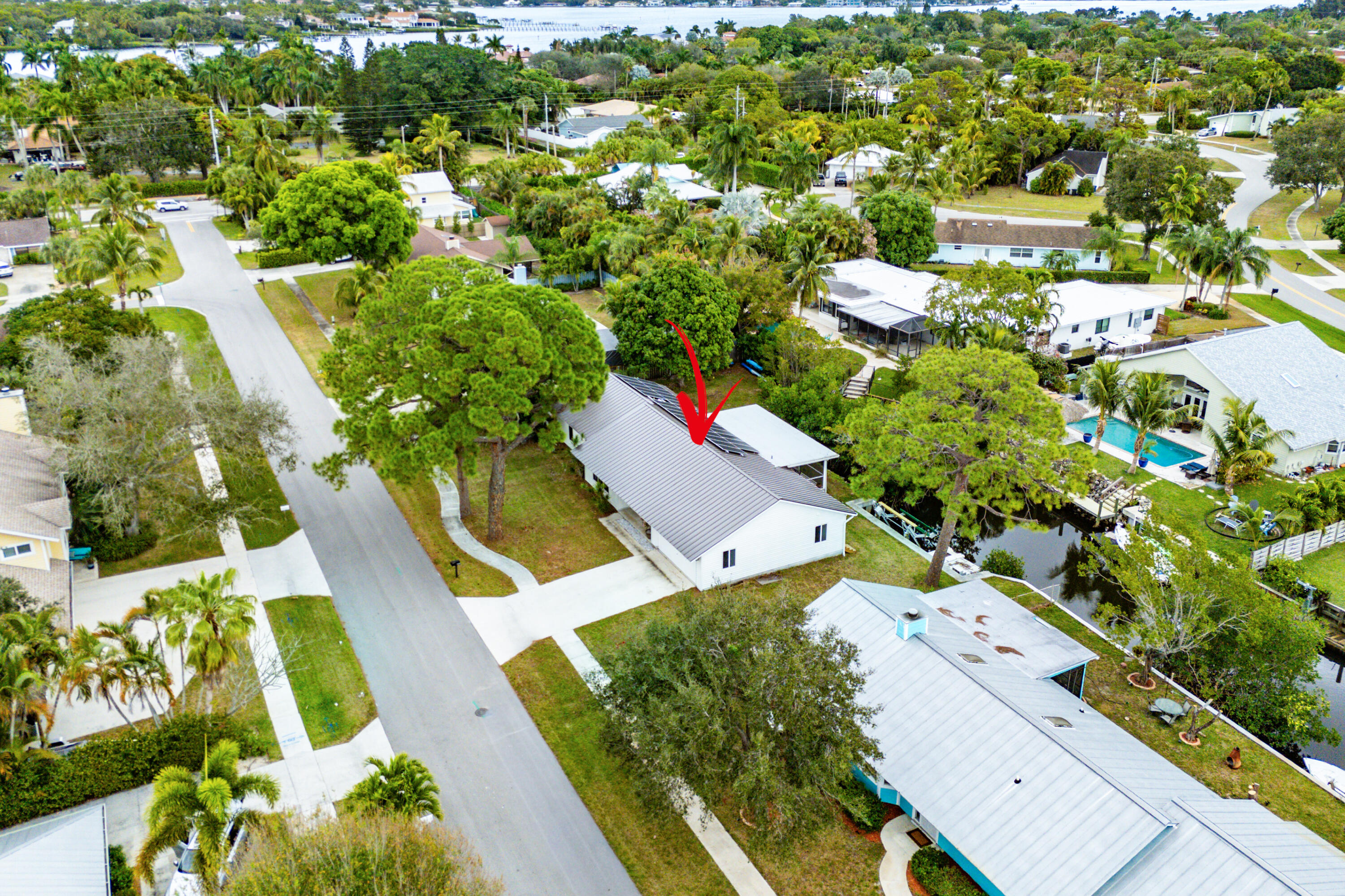 709 Warren Drive Jupiter, FL 33458 - Photo 45 of 56 an aerial view of residential houses with outdoor space