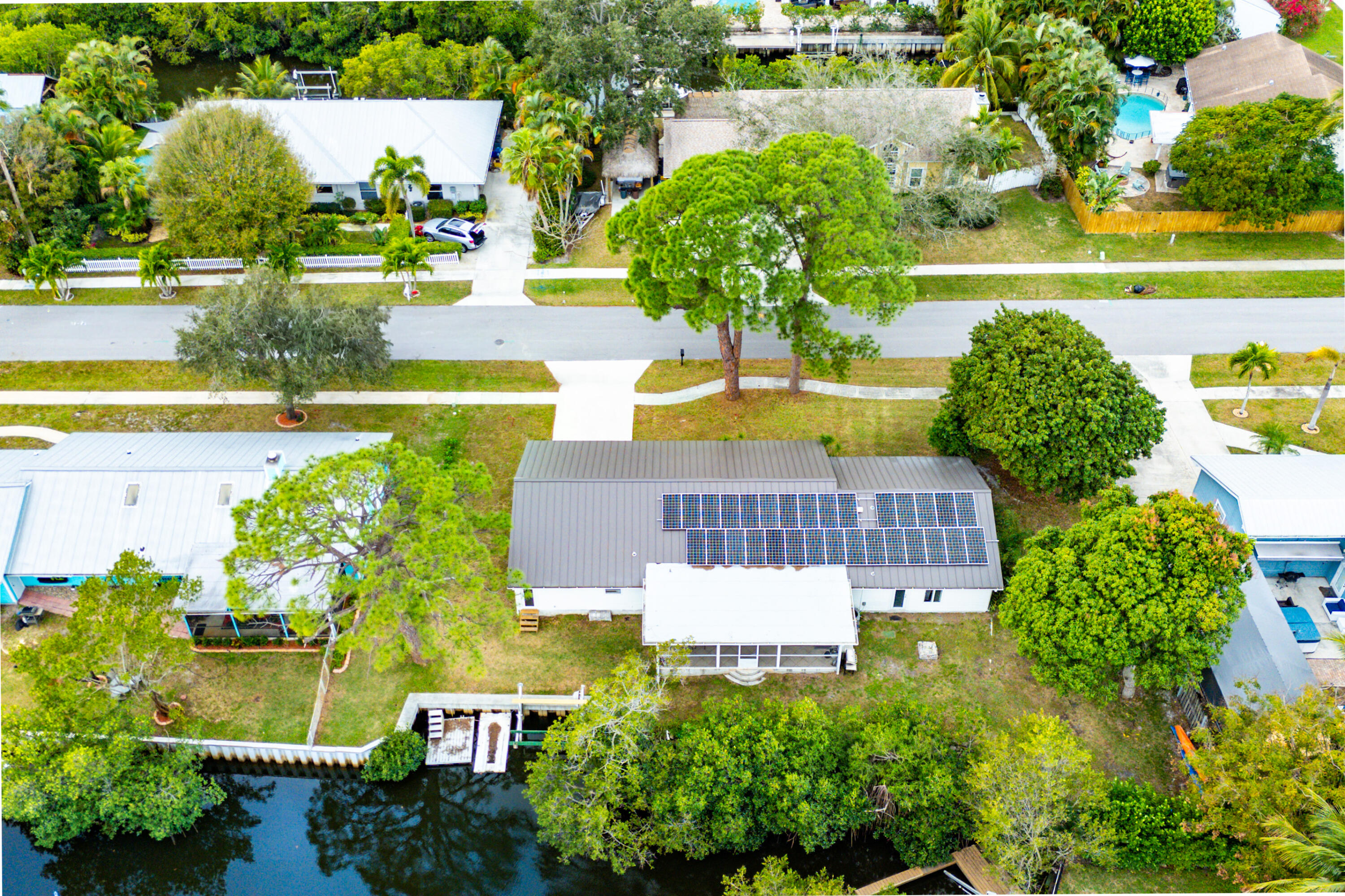709 Warren Drive Jupiter, FL 33458 - Photo 53 of 56 an aerial view of a house with yard swimming pool and outdoor seating