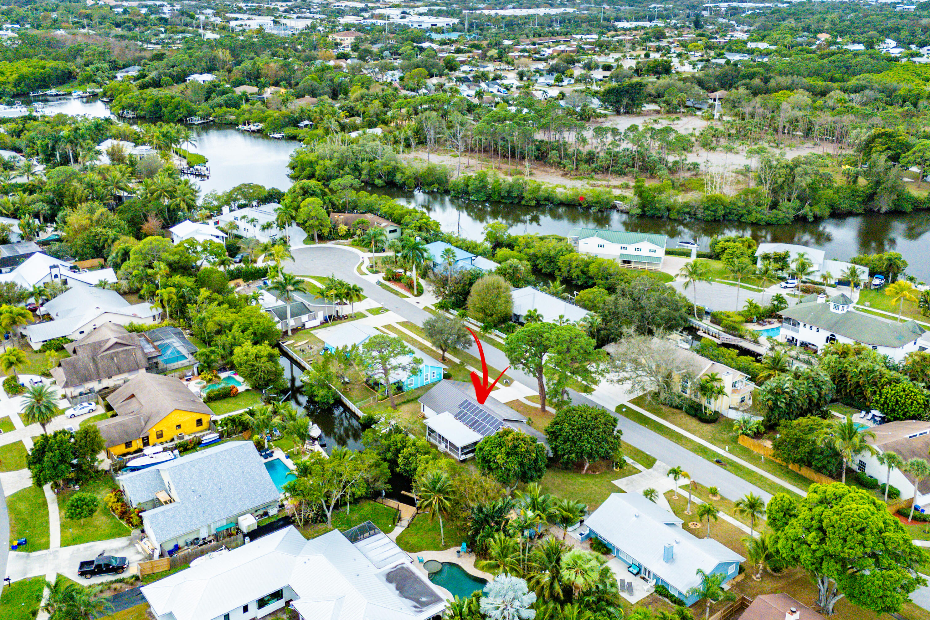 709 Warren Drive Jupiter, FL 33458 - Photo 55 of 56 an aerial view of residential houses with outdoor space and street view