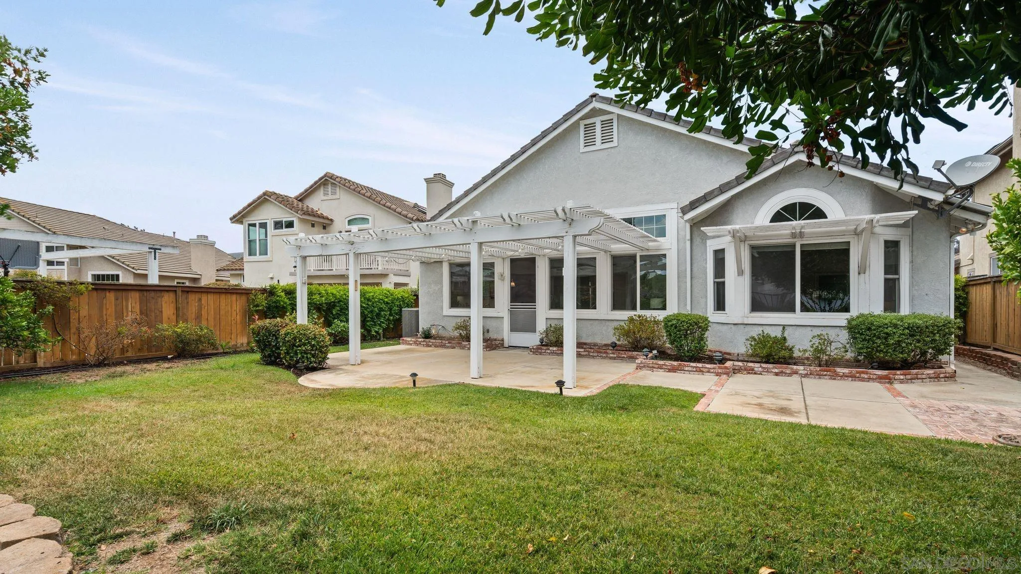1783 Medinah Road San Marcos, CA 92069 - Photo 27 of 39 a front view of a house with a yard