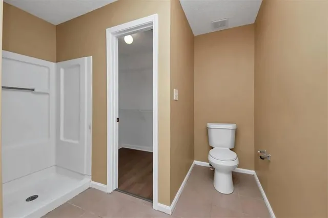 a view of a room with racks on the wall