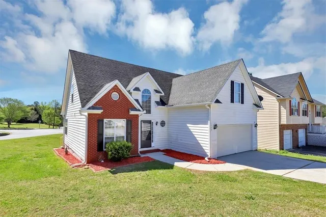 a view of front door with wooden floor