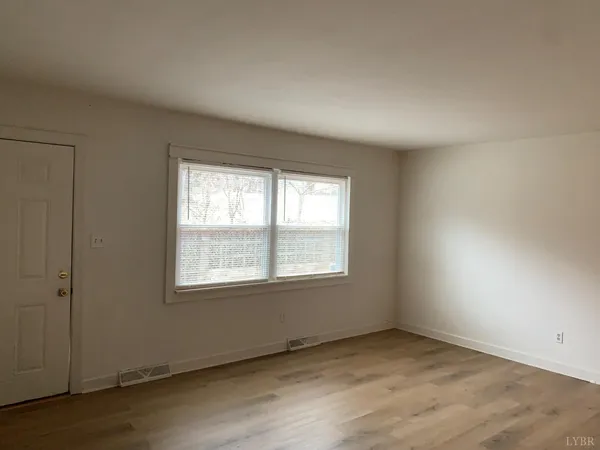 an empty room with a window