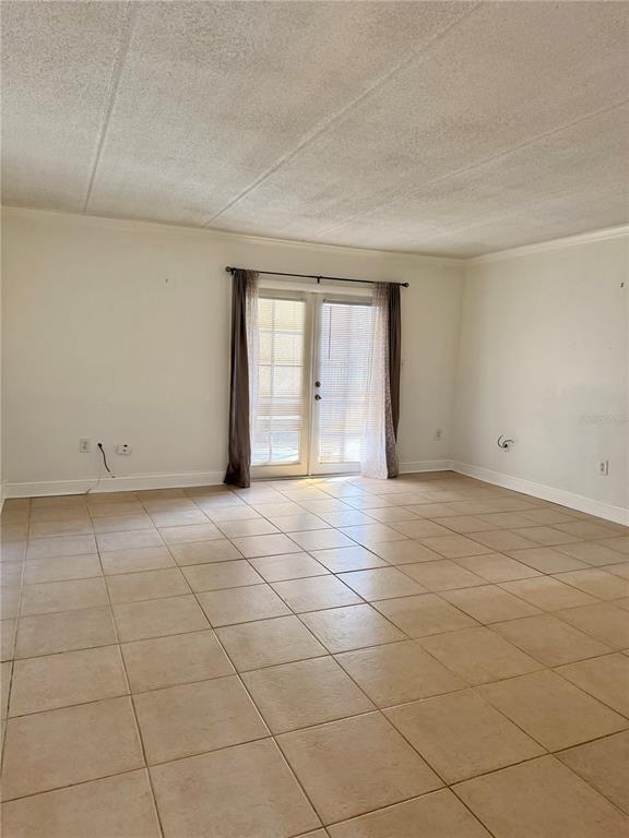 106 Alameda Court, Unit 139 Tampa, FL 33609 - Photo 13 of 13 a view of an empty room with a window