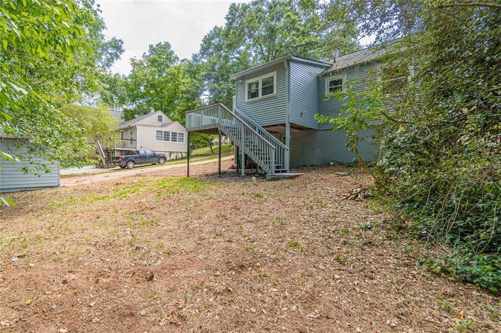 1226 Thomas Road Decatur, GA 30030 - Photo 11 of 38 a view of a house with a yard
