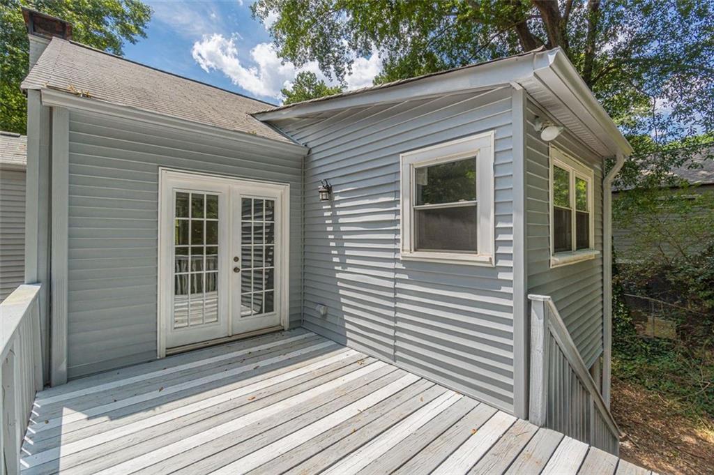 1226 Thomas Road Decatur, GA 30030 - Photo 13 of 38 a view of a house with a door and wooden floor