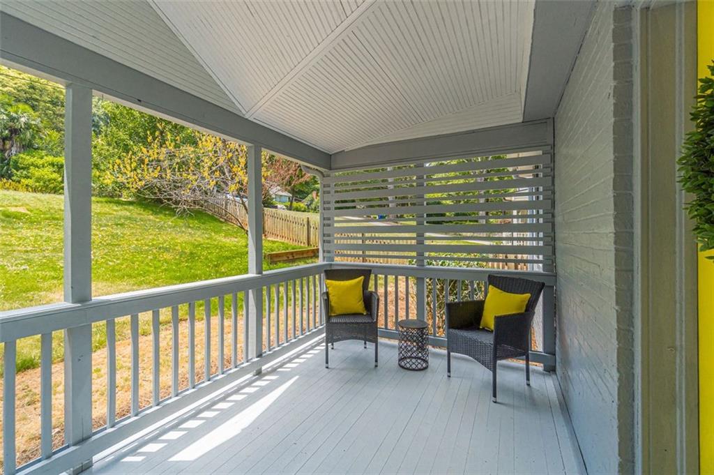 1226 Thomas Road Decatur, GA 30030 - Photo 7 of 38 a view of swimming pool with outdoor seating