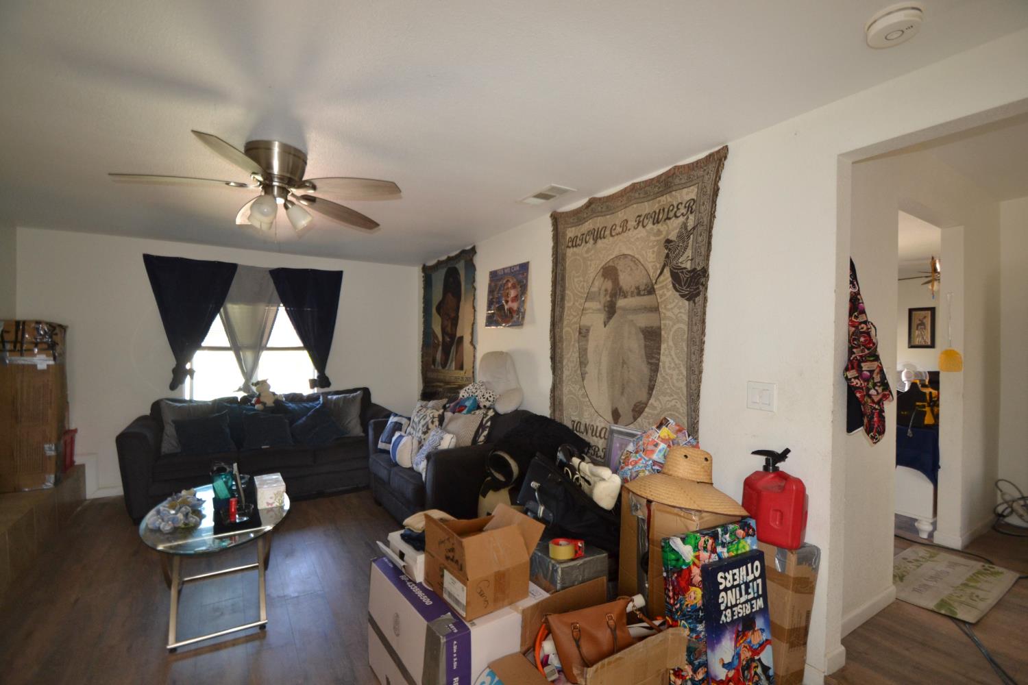 2555 South Lotus Avenue Fresno, CA 93706 - Photo 8 of 15 a living room with furniture and wooden floor