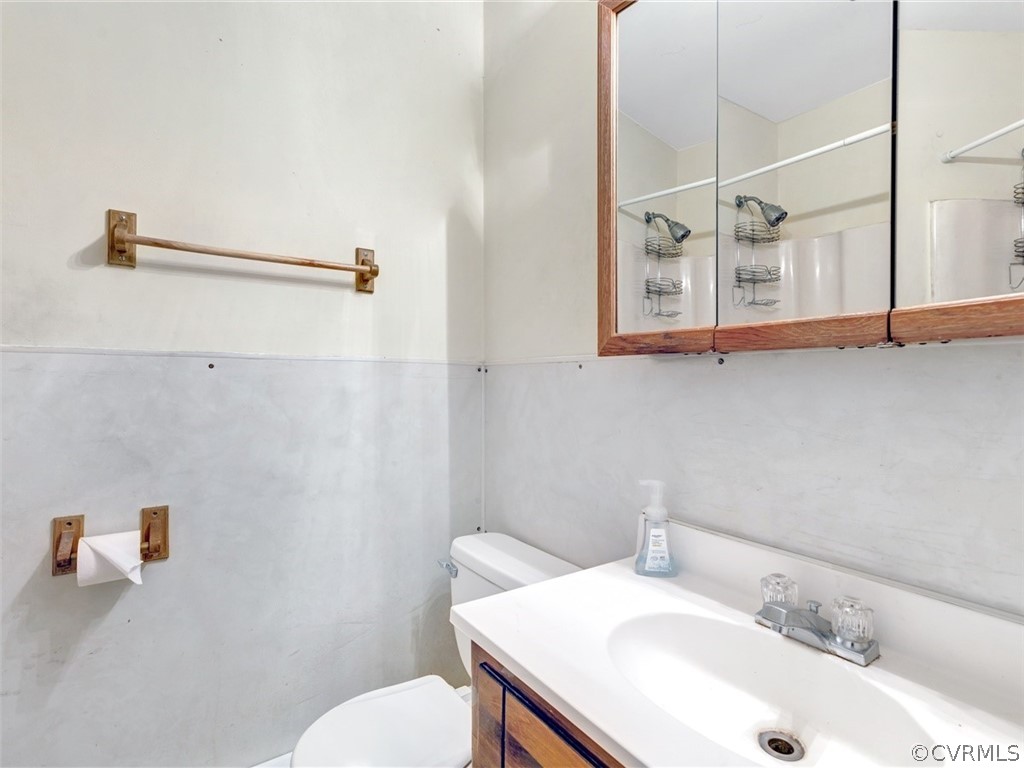 3124 Fielding Road Chester, VA 23831 - Photo 9 of 18 a bathroom with a sink and a toilet