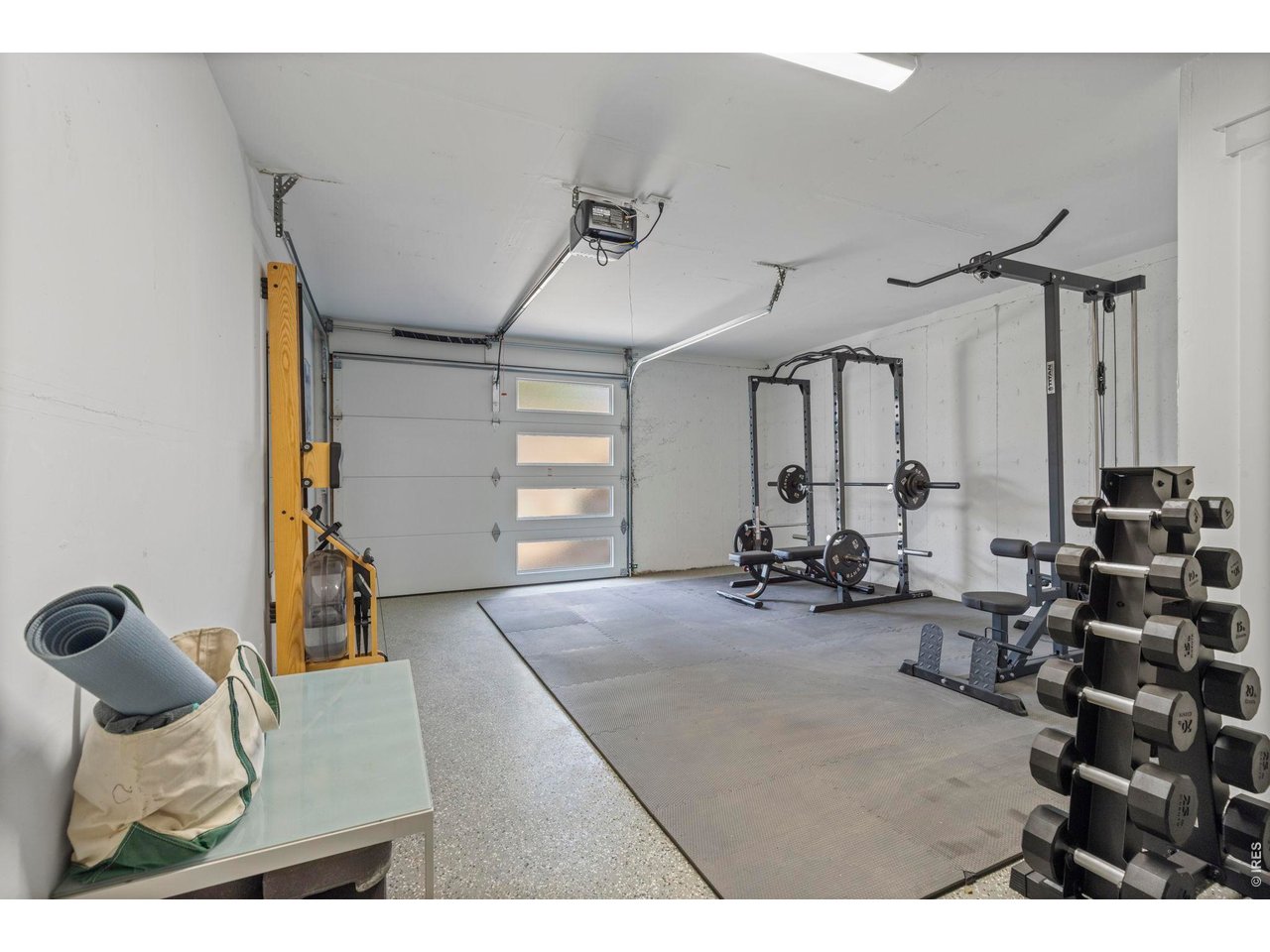1406 Pika Road Boulder, CO 80302 - Photo 32 of 50 One of the garage bays is set up as a home gym.