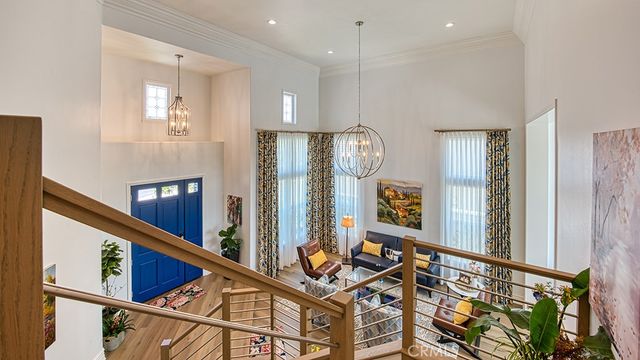 a bedroom with furniture and a flat screen tv