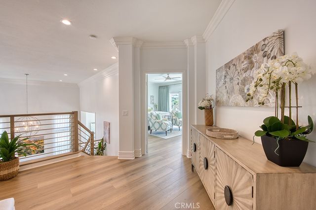 a bathroom with a tub shower and mirror