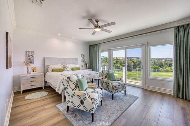 a room with wooden floor and window
