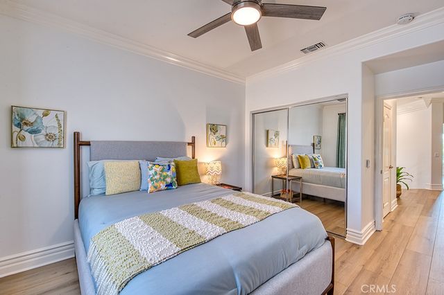 a view of a table and chairs under an umbrella