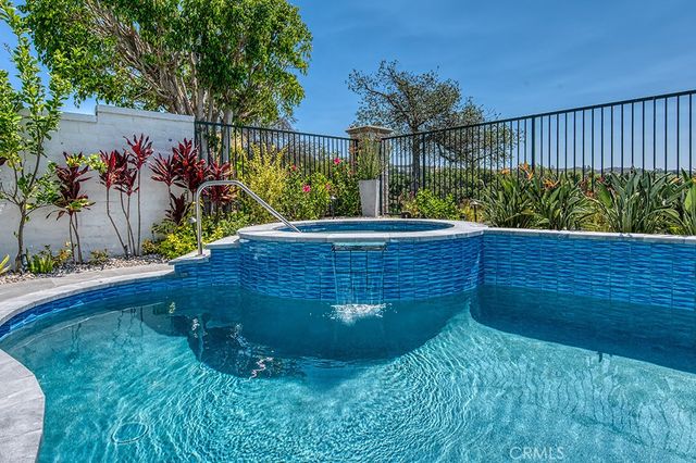a view of a green field with clear sky