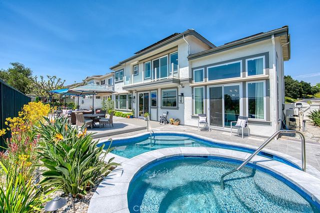 an aerial view of a house with a garden