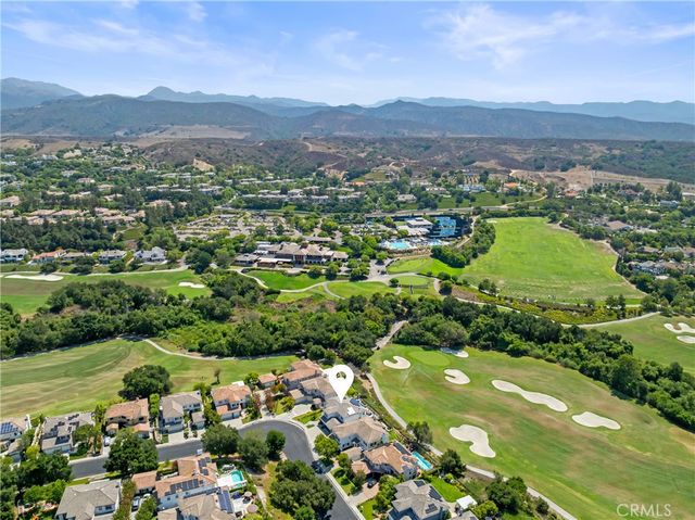 a view of a golf course with a lake