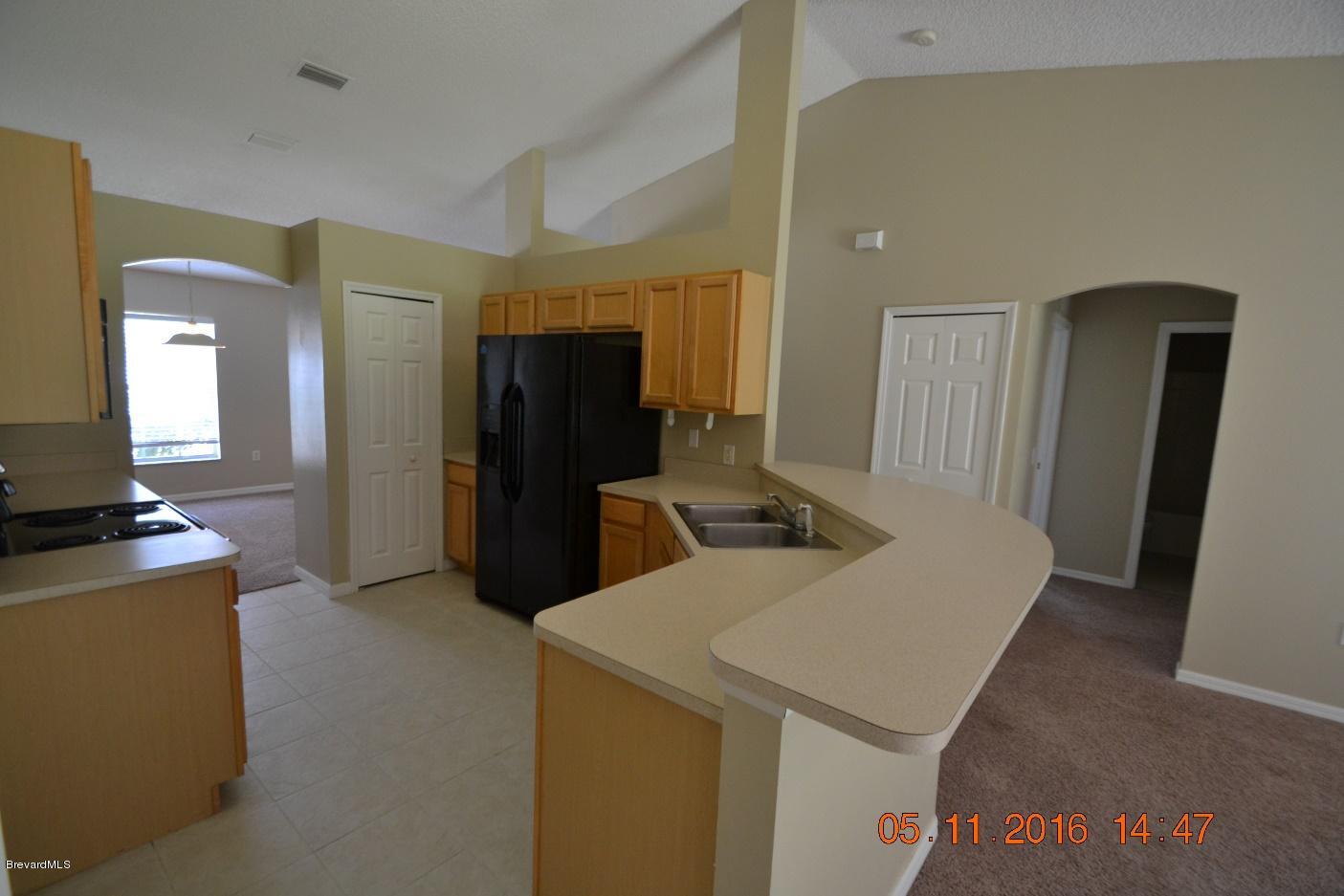 297 Gladiola Road Northeast Palm Bay, FL 32907 - Photo 3 of 10 3