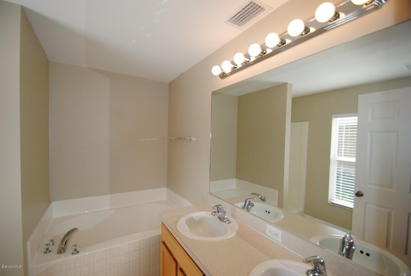 297 Gladiola Road Northeast Palm Bay, FL 32907 - Photo 7 of 10 7
