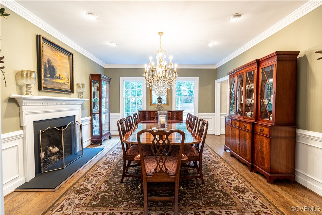 11319 Buckhead Terrace Midlothian, VA 23113 - Photo 11 of 35 a view of a dining room with furniture window and wooden floor