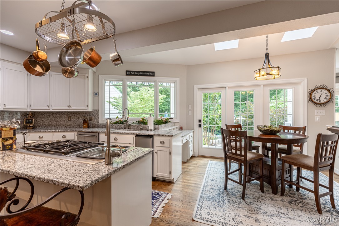 11319 Buckhead Terrace Midlothian, VA 23113 - Photo 16 of 35 a kitchen with a table chairs and window