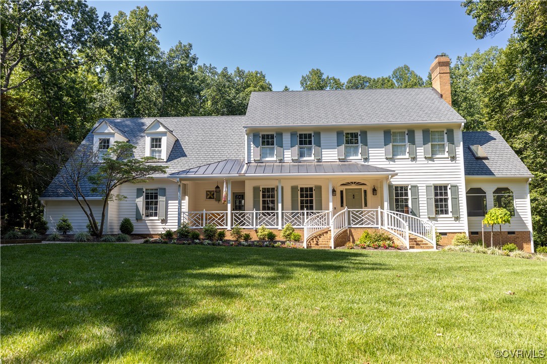 11319 Buckhead Terrace Midlothian, VA 23113 - Photo 2 of 35 a front view of a house with a swimming pool