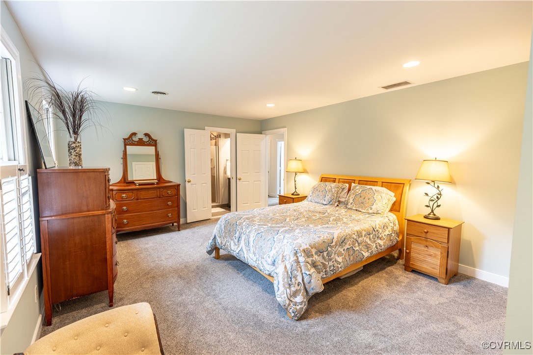11319 Buckhead Terrace Midlothian, VA 23113 - Photo 26 of 35 a bedroom with a bed and dresser