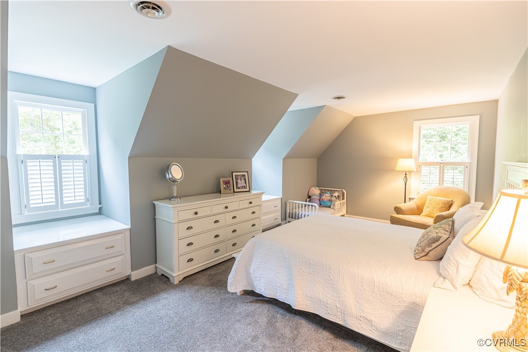 11319 Buckhead Terrace Midlothian, VA 23113 - Photo 28 of 35 a bedroom with a bed and a window