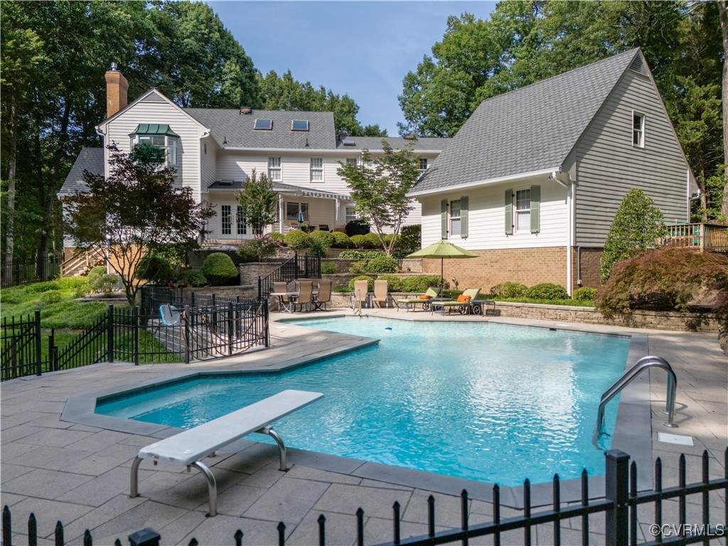 11319 Buckhead Terrace Midlothian, VA 23113 - Photo 3 of 35 a swimming pool with outdoor seating and yard