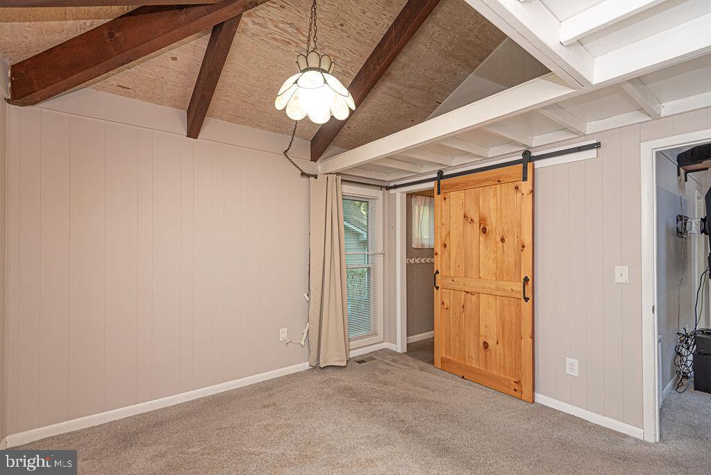 25 Rabbit Run Lane Ocean Pines, MD 21811 - Photo 35 of 89 Barn Doors to Primary Bath