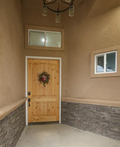 a view of a door with a hallway